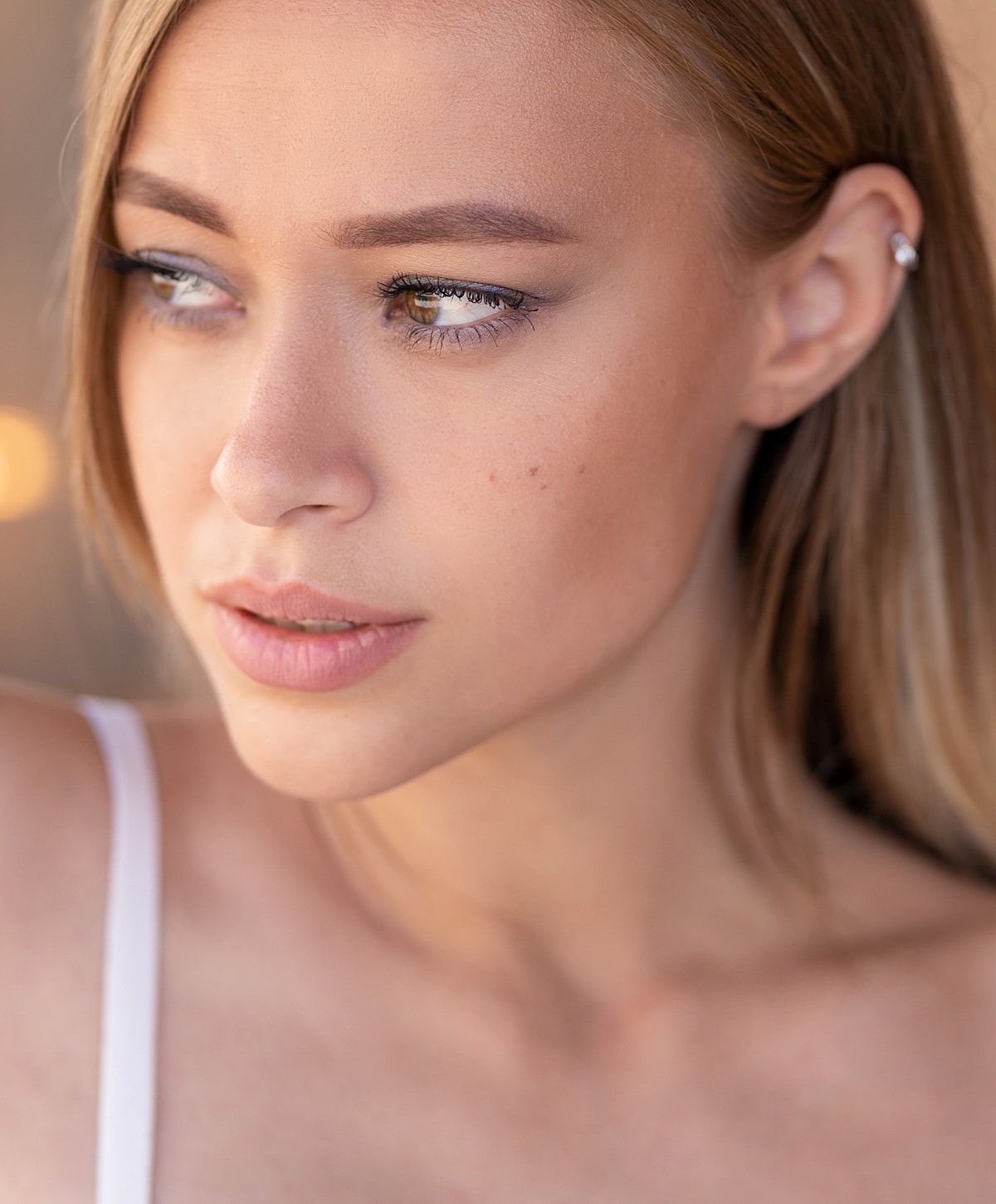 Close-up portrait of a woman with natural makeup.