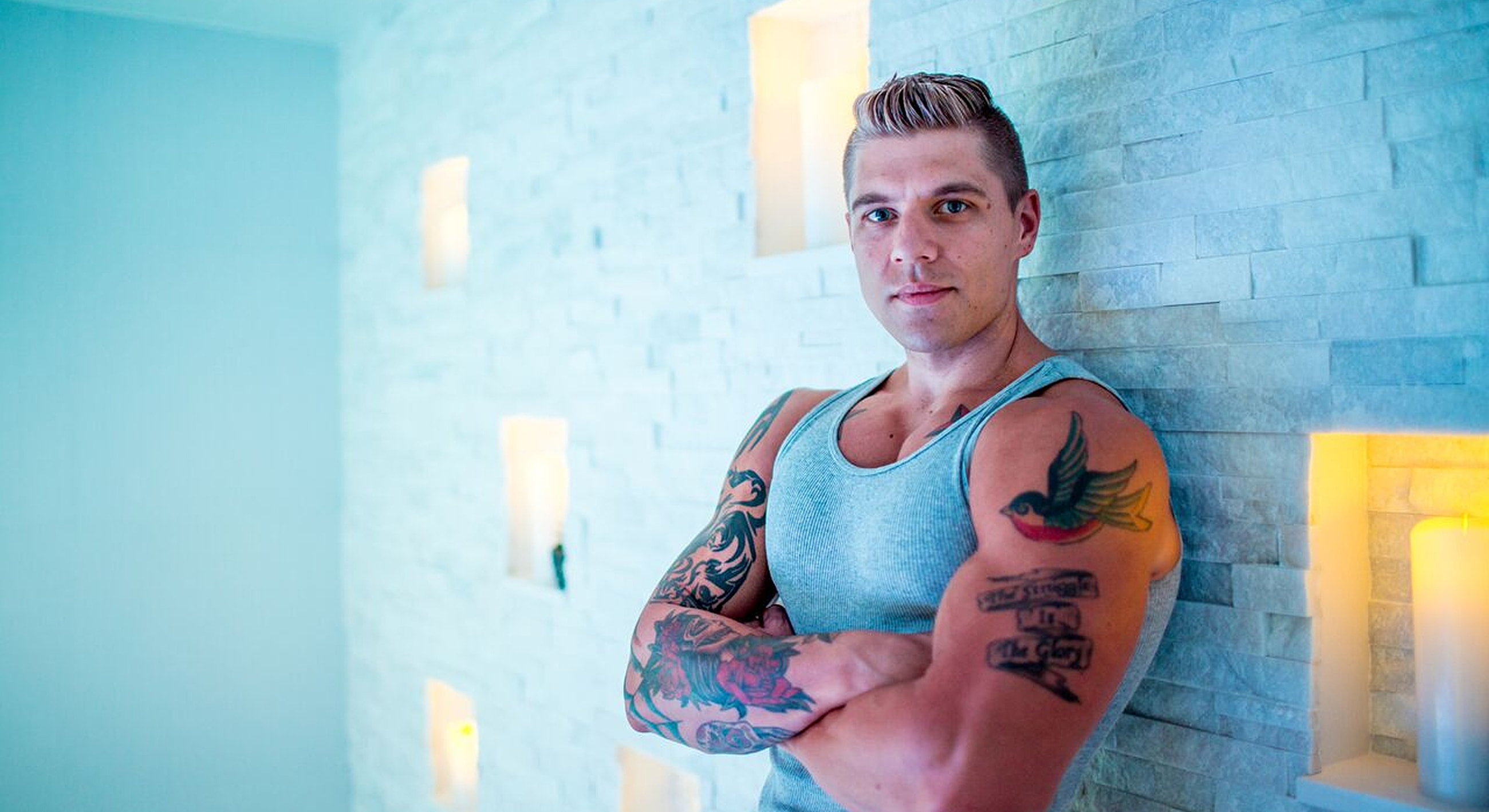 Woman stretching in fitness attire on a bench.